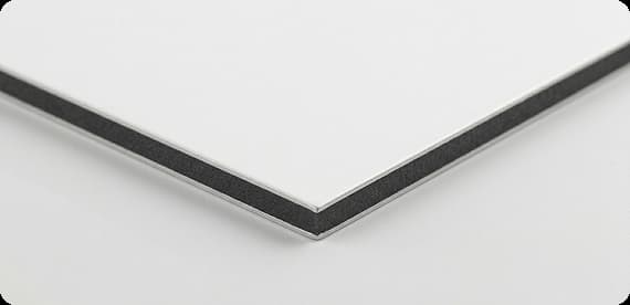 Panel composite de aluminio (tipo Dibond): material rígido para la fabricación de cajas de luz y fachadas comerciales modernas